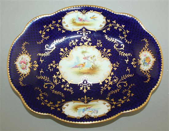 A Coalport scale blue ground eighteen piece dessert service, early 20th century, plates 24cm